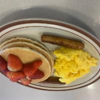 Any Fruit Pancake Combo · Choice of blueberry, strawberry or bananas, 2 eggs, 2 bacon strips or 2 sausage links.