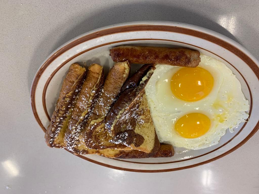 French Toast Combo · 2 slices  of texas bread  whit  powdered  sugar , 2 eggs, and choice of 2 bacon strips or 2 sausage links.