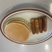 Pancakes with Meat · Choice of 4 bacon strips or 4 sausage links.