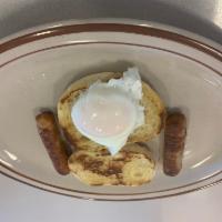 Min #3 · 1 poached egg, English muffin, and a choice of 2 bacon strips or 2 sausage links.