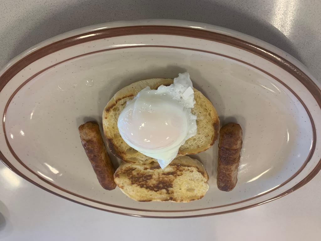 Min #3 · 1 poached egg, English muffin, and a choice of 2 bacon strips or 2 sausage links.
