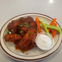 Chicken Wings · 6 pieces served whit celery , carrot , ranch sauce