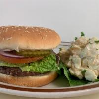 Hamburger · 8 o z of grilled hamburger patty . whit lettuce , tomatoes , onions , pickle  .
choice of fr...