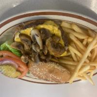 Mushroom Cheeseburger · 8 o z of  grilled hamburger patty , sauteed  mushrooms , american  cheese , whit  lettuce , ...
