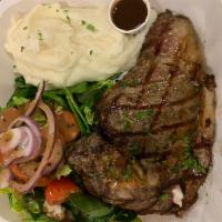 Ribeye Steak  · 10 oz. of Ribeye  Angus beef with mashed potatoes and mixed greens salad .