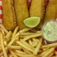 Fish & Chips · Crispy-fried fish with a side of fries, lemon wedges, and tartar sauce.