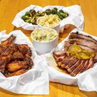 Dcity Showstopper Platter · 1/2 lb. rib tips, 1/2 lb. brisket, 1 dozen smoked wings and 3 large sides.