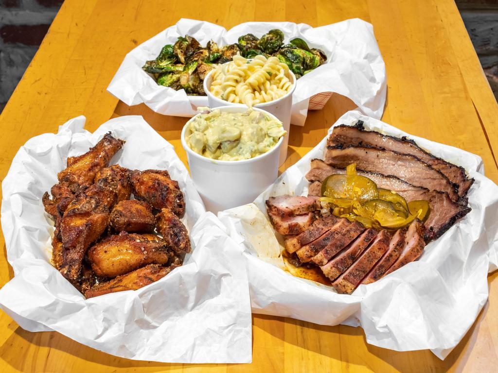 Dcity Showstopper Platter · 1/2 lb. rib tips, 1/2 lb. brisket, 1 dozen smoked wings and 3 large sides.