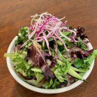 Organic Mixed Green Salad · Mix of iceberg lettuce and organic spring mix with our house dressing. 