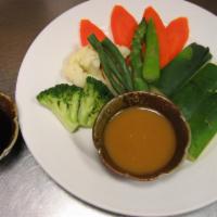 Steamed Vegetable · Served with sumiso and yuzu ponzu sauce.