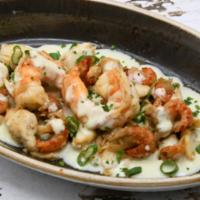 Louisianne Topping · Rich sherry cream, shrimp, crabmeat