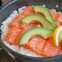 Salmon Sushi Bowl · Sushi rice, salmon, sesame seeds, seaweed, ginger, wasabi, and lemon.