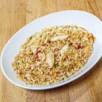 dungeness crab fried rice · fresh dungeness crab fried rice with garlic, egg and green onions.