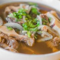 7. Pho Ox Tail · Large only. House special rice noodle soup with ox tail in beef broth.