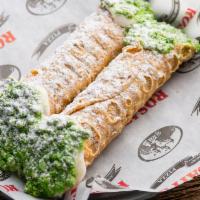 2 Cannolis · Crisp Sicilian pastry shells filled with sweetened ricotta and chocolate chips dipped into m...