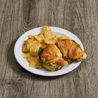 Californian Sandwich · Turkey, avocado, tomatoes, lettuce and mayo on croissant. Served with your choice of fresh v...