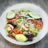 Garden Salad · Mixed greens and iceberg lettuce, tomatoes, onions, cucumbers and mushrooms. Served with 1/2...