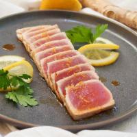 Pepper Tuna · Raw. Seared outside, sliced and served with ponzu sauce.