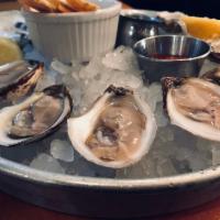 Boutique Oysters on the Half Shell · A selection of local oysters from today's list. They are served on a bed of crushed ice with...