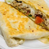 Quesadilla · Flour tortilla, melted cheese, green salsa, and sour cream. Choice of protein. Add-ons for a...