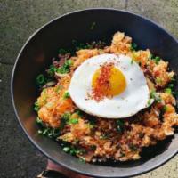 Eemo’s Kimchi Fried Rice Bowl · Made with house fermented caramelized kimchi, onion, fried scallion, spices, topped with sun...