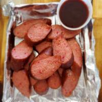 Smoked Sausage (1/2 lb) · Homemade sausage smoked for 6 hours using oak. Add sauce of your choice for no charge.