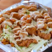 Bayou Fries · The ultimate loaded Cajun frie, hand-cut fries loaded with homemade slaw, fried catfish, fri...