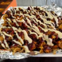 Kretzschy's Smoked Pulled Pork Fries · Fresh hand-cut fries loaded with smoked pulled pork and topped with our signature blueberry ...