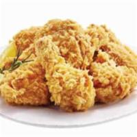 Original Golden Whole Chicken · Deliciously juicy inside and perfectly crunchy outside. Our original fried chicken is known ...
