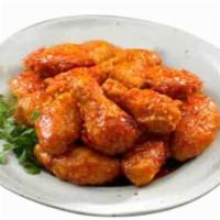 Wings of Fire · -bb wings tossed in a our semi-sweet and Extra hot spicy sauce