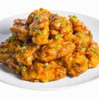 Galbi Wings · A light sweet and savory sauce that has a off the grill flavor. Mixed with green onions and ...