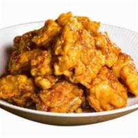 Soy Garlic Boneless · -boneless fried chicken marinated with soy and garlic sauce that is semi-sweet, rich and cru...