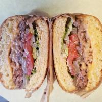 Angus Cheese Beef Burger · Classic beef patty, american cheese, pickles, tomato, red onion, romaine, 1000 island dressi...