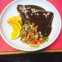 Chicken Mole Quesadilla · Handmade corn tortilla stuffed with grilled chicken, onions, Oaxaca cheese, topped with mole...
