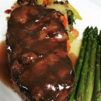 12 Oz Certified Prime Angus Beef New York Strip · This classic is char-grilled to perfection and topped with our signature zip sauce. Served w...