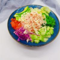 Kani Salad Poke bowl · Corn. Avocado. Edamame. Seaweed salad. cucumber. lettuce. Tomato. Nori. Nut slice. mayonnais...