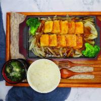 31. Tofu Teriyaki · 12pcs Fried tofu with teriyaki sauce. Served with rice and miso soup or green salad.