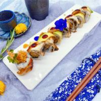 S4. Tomo Roll · 8 pieces. Shrimp tempura with eel and avocado outside.