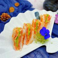 S13. Spicy Tuna Sandwich · Inside: spicy tuna and crab. Outside: wrapped with soy paper and chef's sauce.