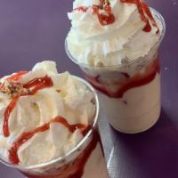Fresas con Crema · 16oz cup of freshly cut strawberries and prepeared with a house cream and strawberry drizzle...