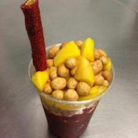 Bombazo · Choose form our different flavors of slush. a mixture of Japanese peanuts, tamarind candies,...