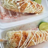 Elote Entero Regular · Corn in the cub with butter, chile powder, cotija cheese and mayonnaise.
Elote en palo con m...