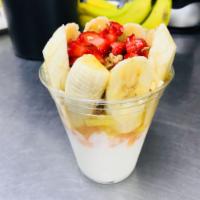 Yogurt with Fruit · Vanilla yogurt prepped with diced pineapple, diced cantaloupe, sliced banana, strawberry, gr...