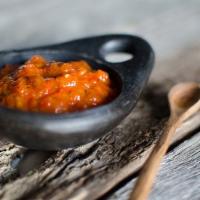 Ajvar · Roasted red peepers and eggplants mixed with pure sunflower oil, distilled vinegar and mildl...