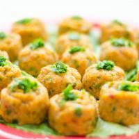 Lentil Patties · Boiled lentils mixed with cracked wheat, scallions and parsley.