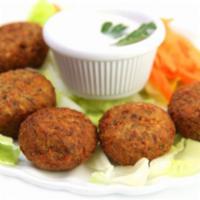 Falafel · Chickpeas, onion and celery seasoned with garlic, parsley and herbs. Served with tahini sauce