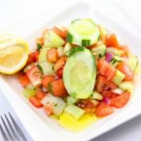 Shepherd Salad · Finely diced tomatoes, cucumbers, green peppers, onions, parsley and tossed in olive oil and...