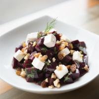 Beetroot and Feta Cheese Salad · Beetroots, feta cheese, parsley, mixed with lemon vinaigrette and garnished with golden rais...