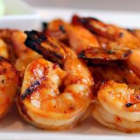 Grilled Shrimp · Marinated grilled shrimp, grilled veggies and served with house salad.