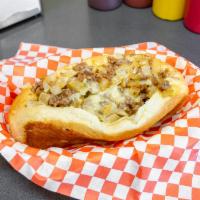 5. Small Onion Cheesesteak Sandwich · Seasoned beef rib steak, grilled onions, & melted white American cheese on a soft Italian ro...